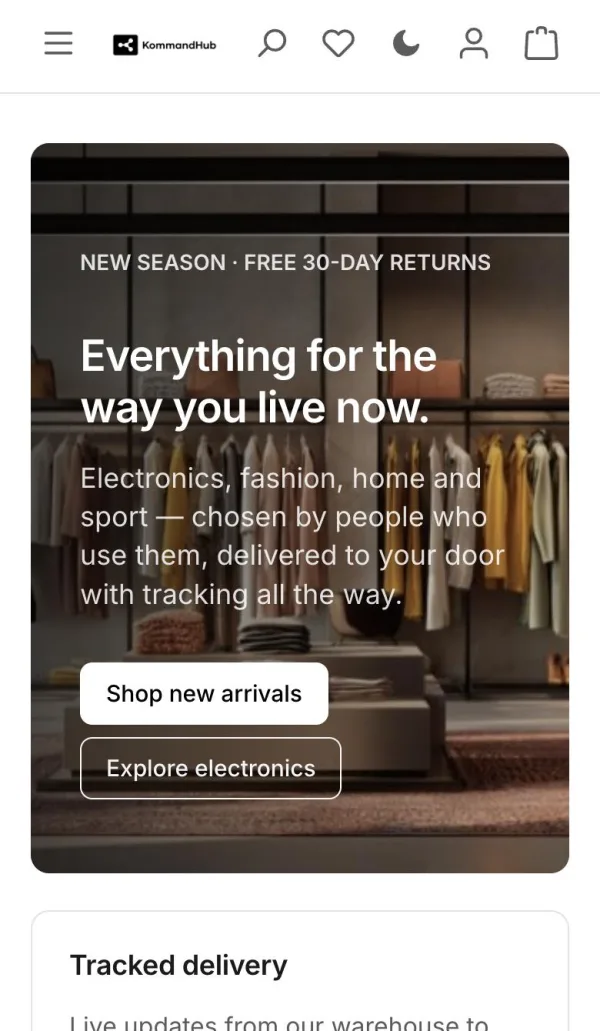 The storefront on a phone in light mode, with the dark-mode moon in the header beside search, wishlist, account and cart.